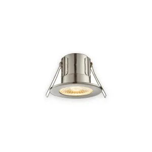 Satin metal ShieldECO recessed downlight with warm illuminated optic and spring clips