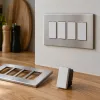 Illustration of labelled closed modular switches in a kitchen