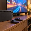 Illustration of a Nintendo Switch style gaming setup in a living room