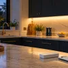 Illustration of under cabinet LED strip lighting and a closed controller