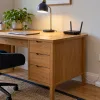 Illustration of an organised home office with an accessible extension lead