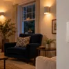 Illustration of a closed rotary dimmer beside warm room lighting
