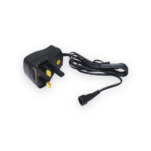 Black UK three-pin universal power supply with coiled cable and round output connector
