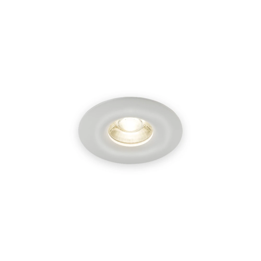 Knightsbridge Odina Single Fixed Round Downlight White with complete bezel and illuminated glass optic Knightsbridge Odina Single Fixed Round Downlight White with complete bezel and illuminated glass optic