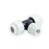 MDPE reducing tee with three ribbed white compression nuts, dark body and visible bores
